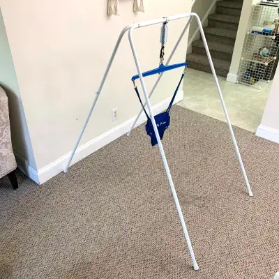 Jolly Jumper baby bouncer with stand perfect for keeping your baby active, entertained, and developi...