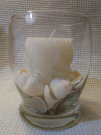 Clear Glass Curved Table Vase with Candle and Sea Shells