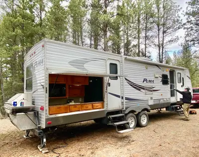 Well-maintained 31 ft family bunkhouse trailer ready for the camping season! $19000 OBO Key Features...