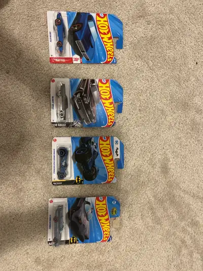 } Hot Wheels 4 car lot for sale. Includes Batman cars, Chevy Impala and Custom Otto. Carded and unop...