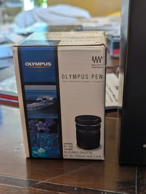 Olympus E-M 10 Camera and the following lenses: 1. 14-42 mm (standard with camera) 2. ED 40-150 mm f...