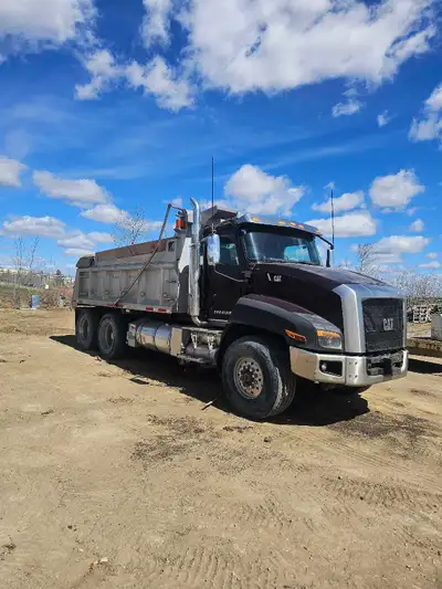 Better than Kenworth and Peterbilt gravel trucks. One of the biggest interiors if not the biggest in...