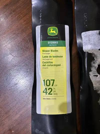 New John Deere Lawn Motor Blades. Never used. Asked $45 obo.