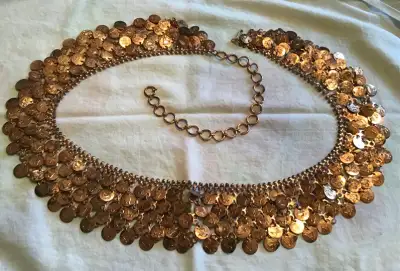 Vintage copper coin belt with Aztec design, fits any waist size. Jingles beautifully when you dance...