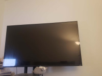 TCL 55'' 90% new large TV with stand