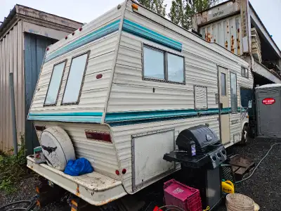 28 ft Security RV GMC That is a good clean living space. It's winterized everything works Heat , sho...