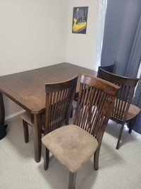 Dining table set. 4 chairs + extension 