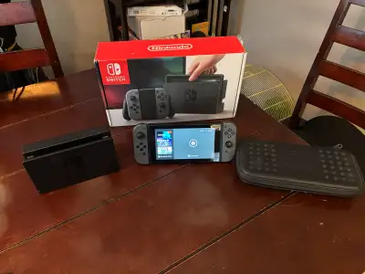 Original Nintendo switch system. Includes all original parts and box, plus carrying case. The system...