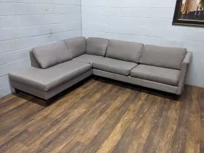 Grey sectional. FREE DELIVERY, View more