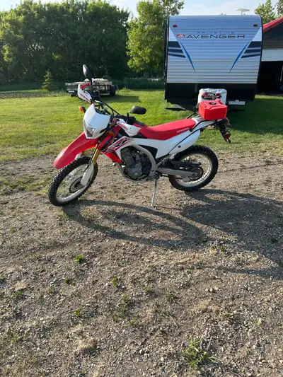 Looking to sell my 2015 Honda CRF250L, dual-sport motorcycle with 5011 kilometers. It's in used cond...