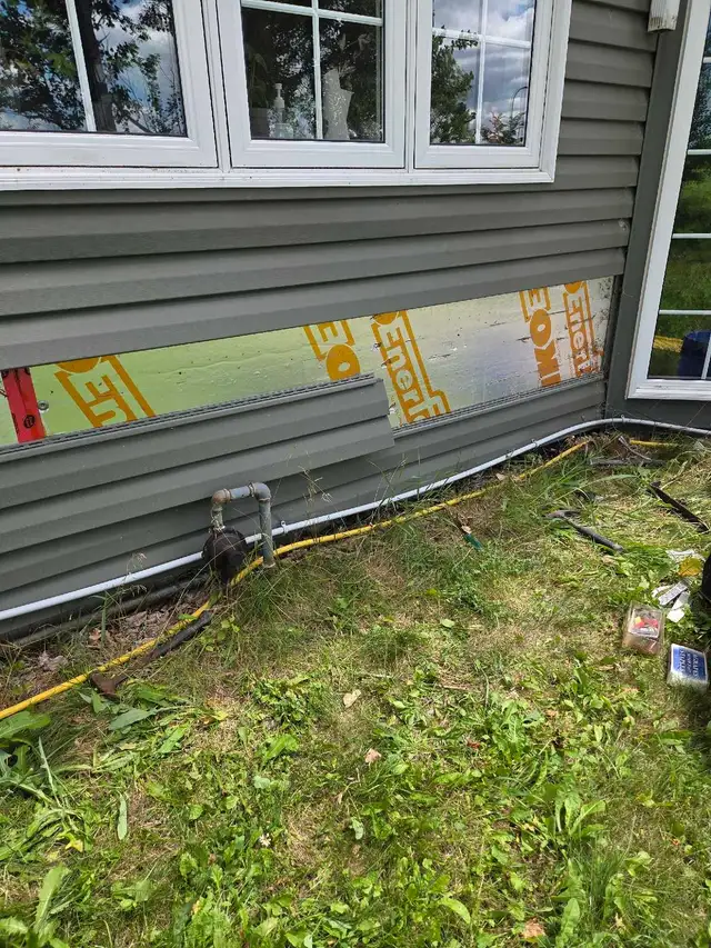 Vinal Siding Repairs and installing 