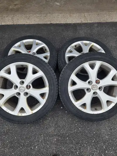Michelin X-Ice Tires and 17 inch Mazda Rims $159 for all Tires 205/50/17 All made in 2019 Two have 7...