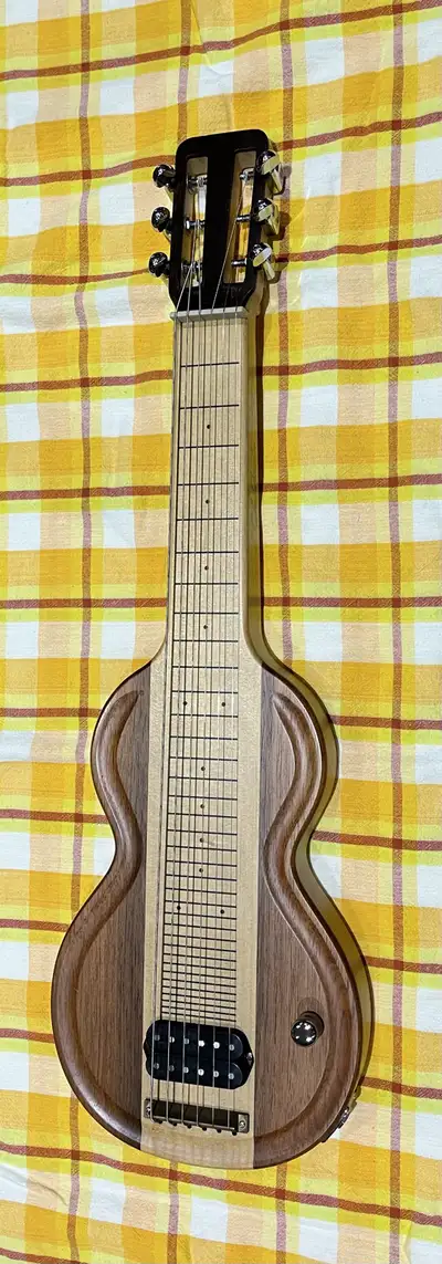 ColeClark Lapdog lap steel guitar for sale/trade Made in Australia an kinda rare in Canada Has a vol...