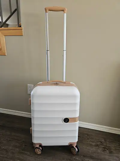 Lightweight, hardshell carry on with spinner wheels and expander, View more