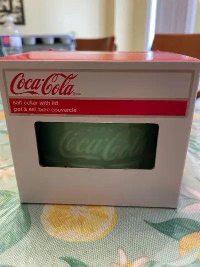 For sale is a brand new Coca Cola Coke salt cellar with Lid - jadeite glass 14 oz.