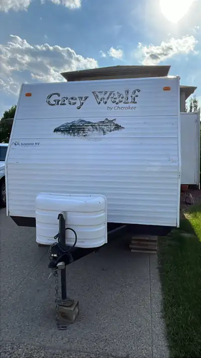28’ Grey Wolf Camper bumper tow trailer. Sleeps 9 Queen bed, bunks, table bed, and jackknife couch/b...