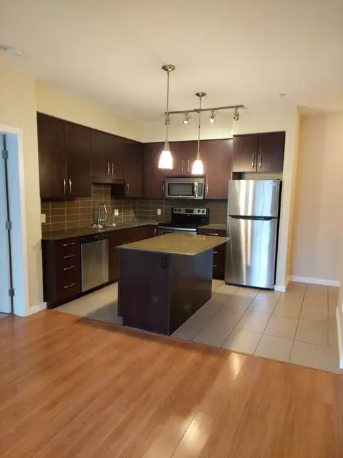 935 SQFT | 10.5 ft ceilings | 2 Baths | 1 Parking | Balcony Bright and spacious corner unit with two...