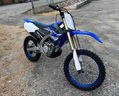 All stock. Just serviced at Banner Sports. 45 hrs. Electric start