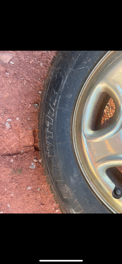 Studded tires on chev 1/2 rims 16 inch $350