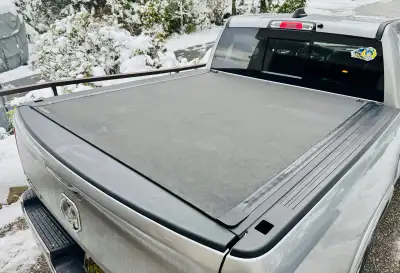Selling a BAK Revolver X4S premium roll-up tonneau cover. Fits RAM 1500 with 5’7” bed (compatible wi...