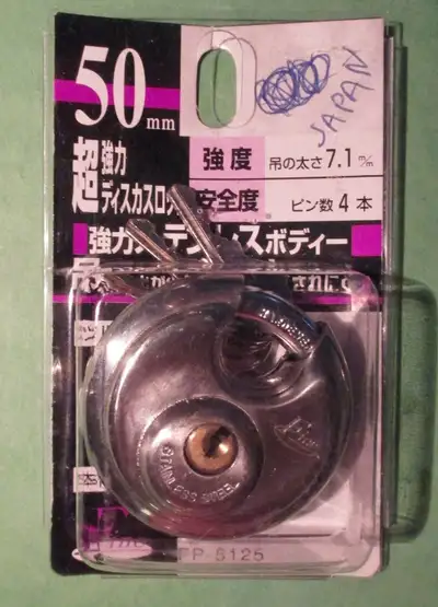 Fine Discus Padlock 50mm Brand new, never used. Purchased in Japan. 3 x keys. Stainless Steel. Harde...