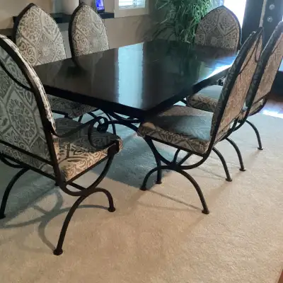 Wrought iron dining room table and chairs, View more