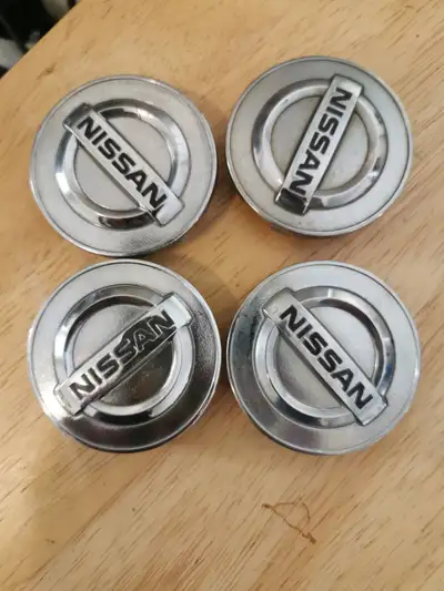 Nissan Alloy wheels center caps , Hub Caps, Fit Original rims only OEM orginal Nissan Dia 55 mm fits...