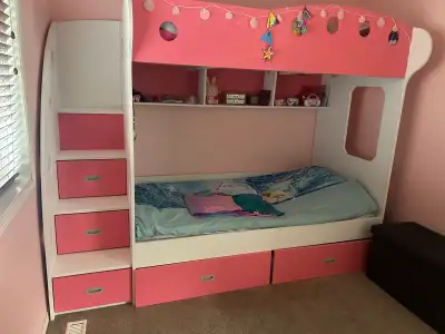 This is a super cute, gently used kids bunk bed with storage steps and drawers underneath. The bed i...