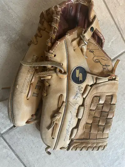 Baseball Glove Signed by Joe Carter,  Al Leiter and Paul Molitor, View more