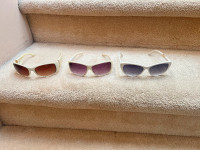 White sunglasses, $20 each