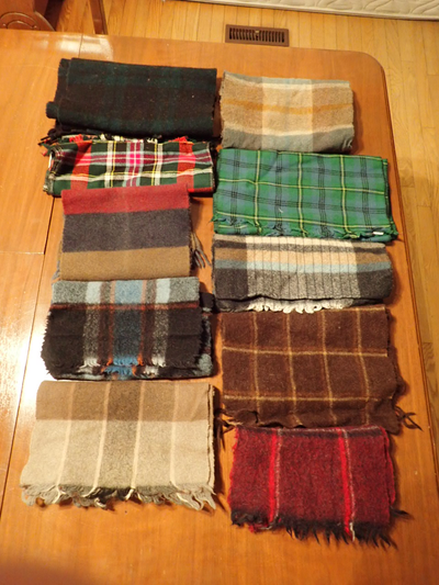About 15  Different 100% Wool Scarfs about 50        by 9 inches, View more