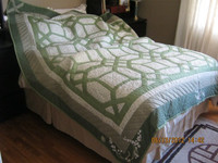 Machine pieced and hand quilted, Queen size bed quilt.