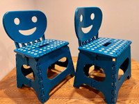 Two child size folding chairs
