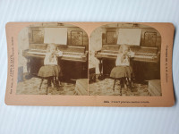 Turn of the Century Girl  & Piano  Kilburn Stereoview Card