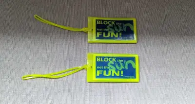 Two Brand New Luggage Tags