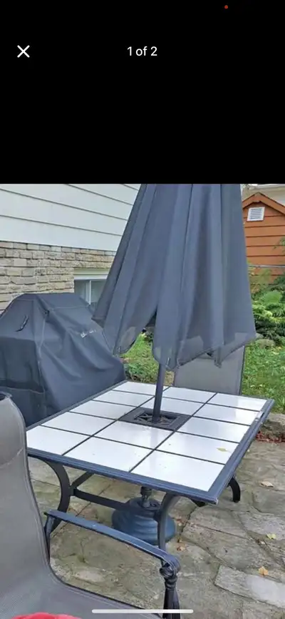 6 person patio furniture set. Comes with table with tile inlay, 2 swivel chairs, 4 fixed chairs & um...