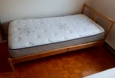 NEIDEN natural solid wood pine bed frame, size Twin. Including LURÖY slatted bed base. Bed frame is...