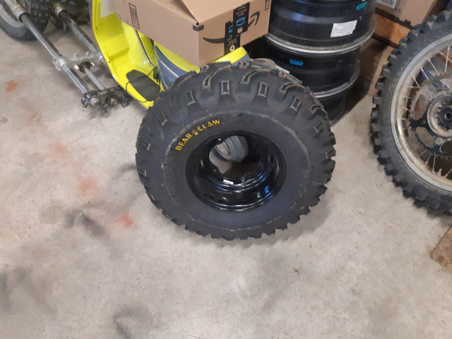 Brand new sport quad front wheel/tire in Other in Red Deer