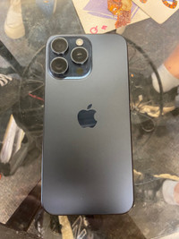 iPhone 15 pro max with charger, case and AirPods 