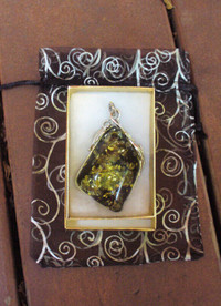 Green Amber Pendant in Silver Setting, for a necklace or broach