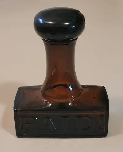 Vintage Rare Avon Amber "PAID" Stamp Cologne Bottle with no chips or cracks Measures: 5 inches tall...