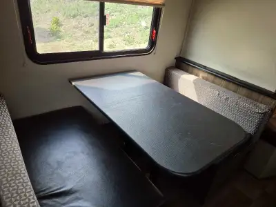 4900 lbs dry weight, queen bed , double bunk, jack knife couch, power awning. Kids are all grown up...