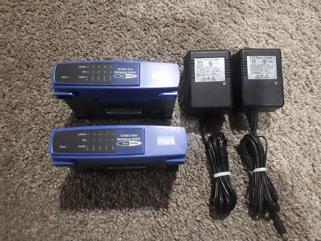 Pair of Linksys 5-Port Router in Networking in Kitchener / Waterloo