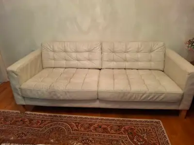 Used white leather sofa  with cover, View more