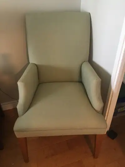 Light green fabric chair great condition wood pick up south Etobicoke serious inquiries only and cas...