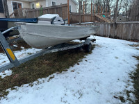 12’ aluminum boat + motor trailer & extras 