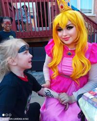 Princess peach, face painting, twisted balloons, glitter tattoos