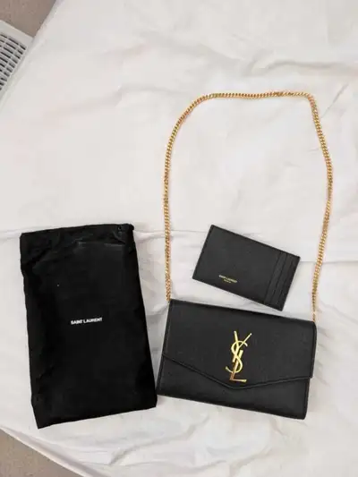 YSL UPTOWN CHAIN WALLET IN GRAIN DE POUDRE EMBOSSED LEATHER, View more