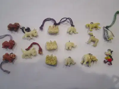 Vintage celluloid charms, from the 1930's-40's. These are often advertised as Cracker Jack charms, b...