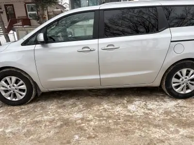 I am selling my silver Kia Sedona with 8seats , a reliable and spacious minivan perfect for families...